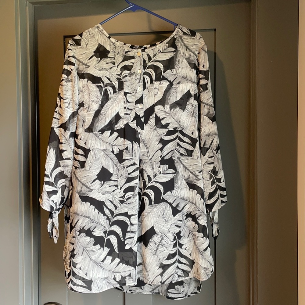 Tunic with shell